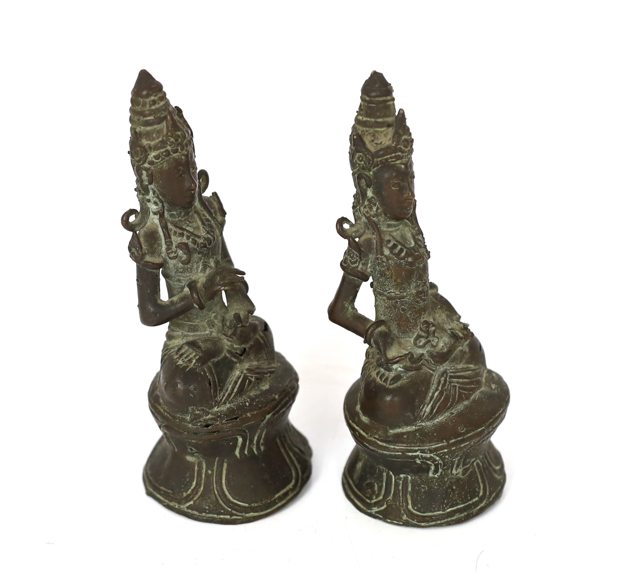 A pair of bronze seated figures of Bodhisattva, Java, 18th/19th century, each 10cm, Please note this lot attracts an additional import tax of 5% on the hammer price